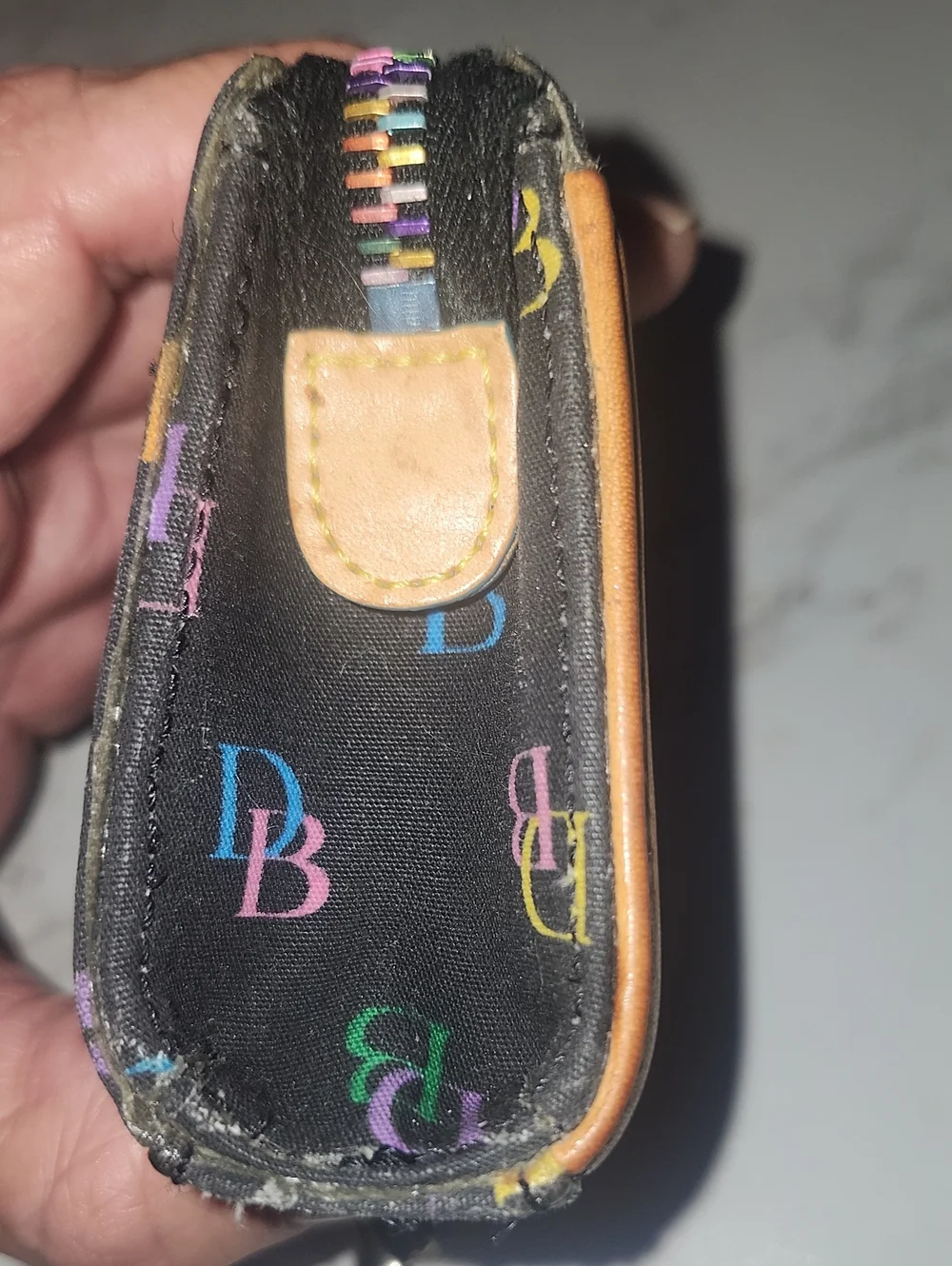 Dooney & Bourke black rainbow monogram wristlet